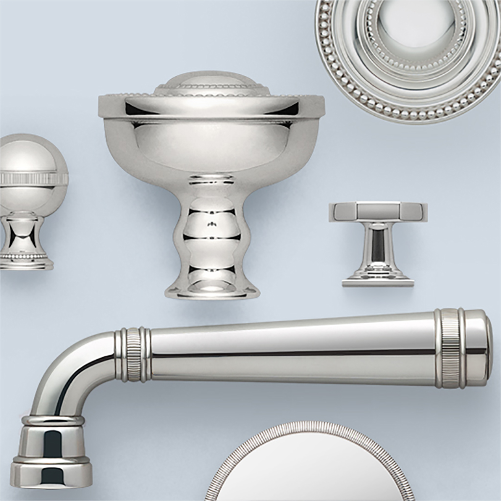 Ensemble of architectural door hardware in polished nickel.