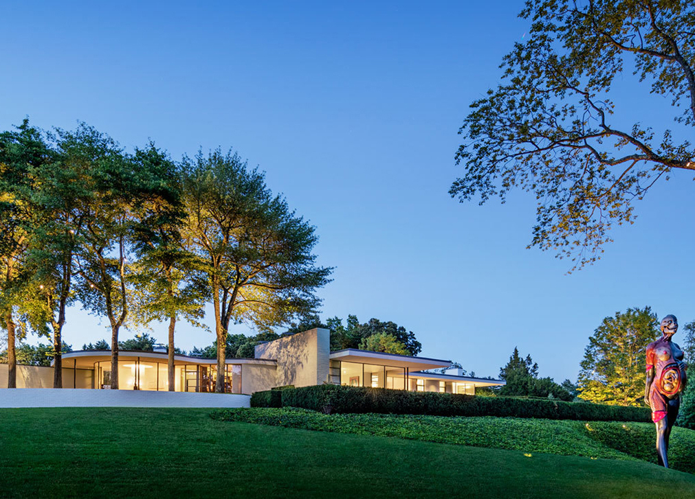 Mid-century restoration by Steven Harris Architects features H. Theophile fin cuffs.